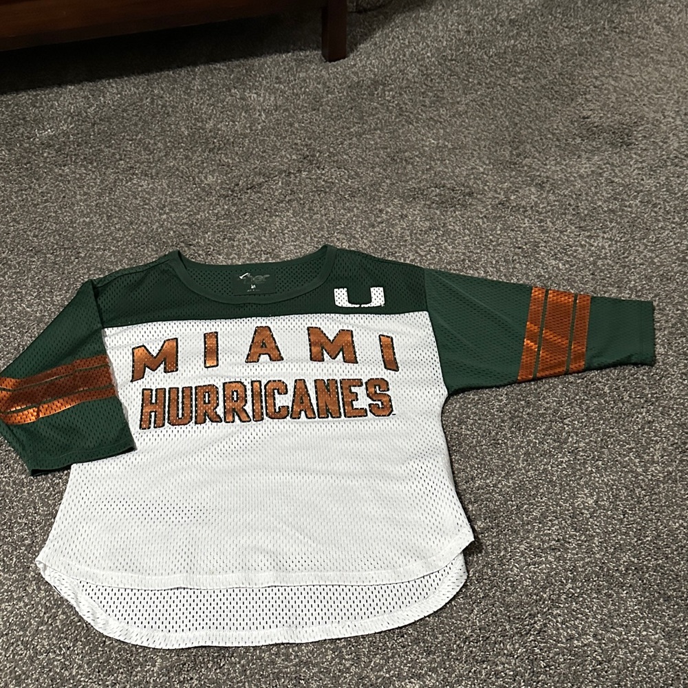 Women’s Miami Hurricanes top.  Size Medium.